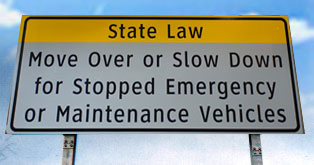 Move Over or Slow Down sign